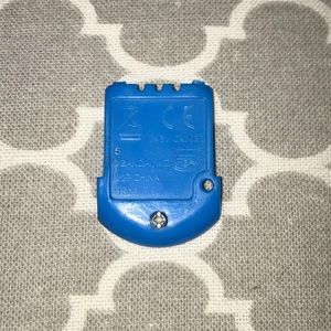 back of a tamagotchi pet